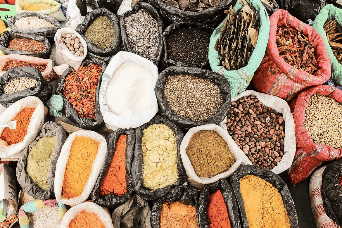 Various spices and herbs in bags on display