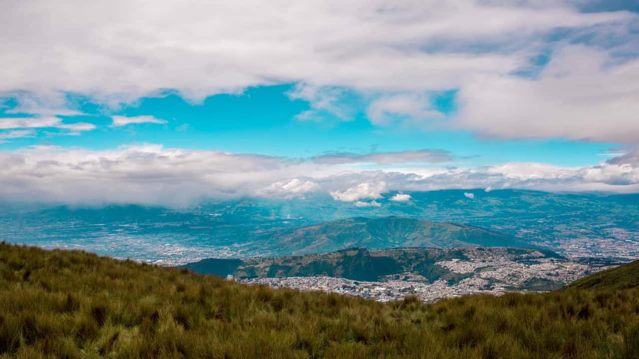 Mountain view overlooking a city and sky