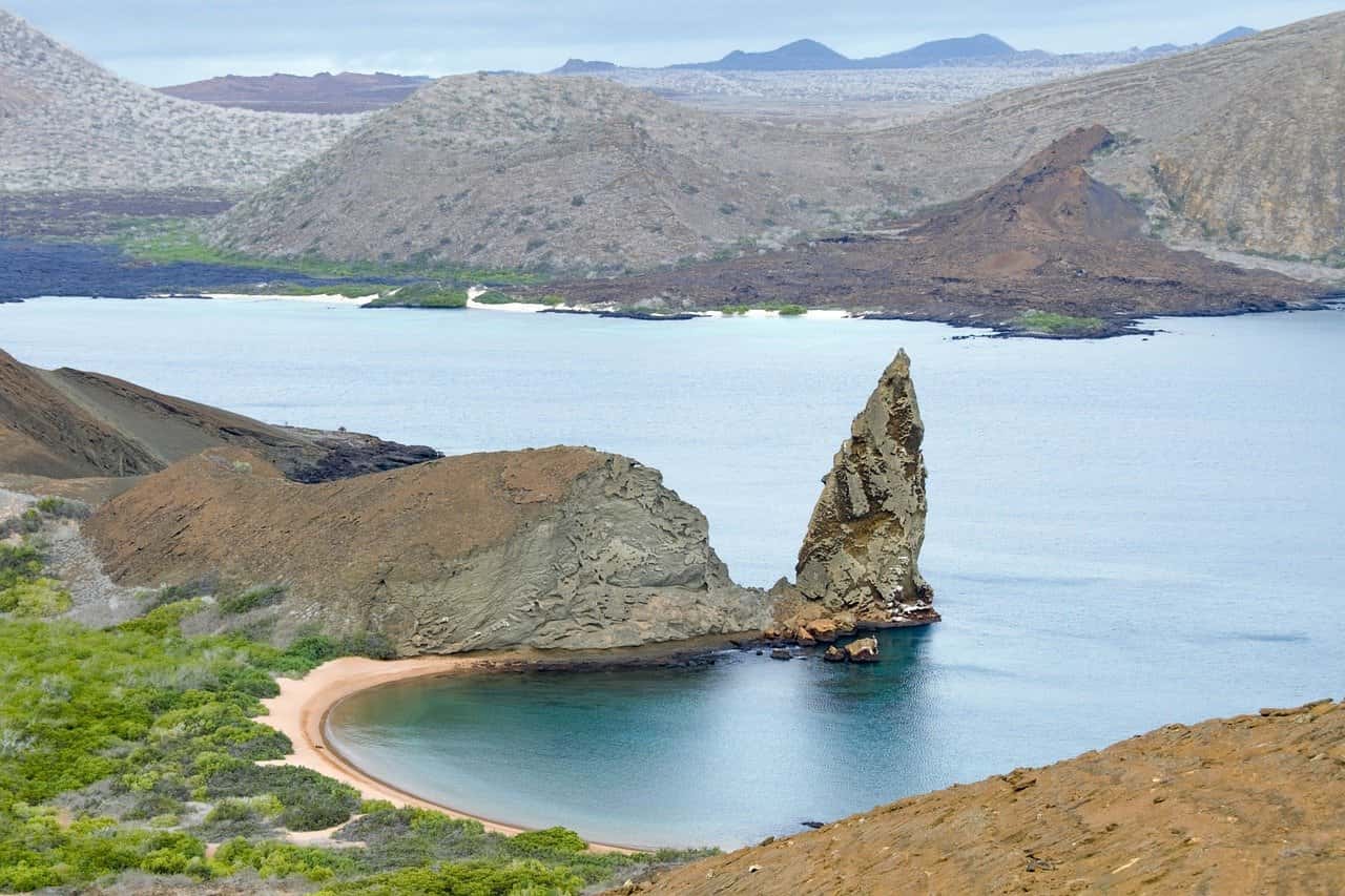 Scenic view of a coastal landscape with a rocky formation