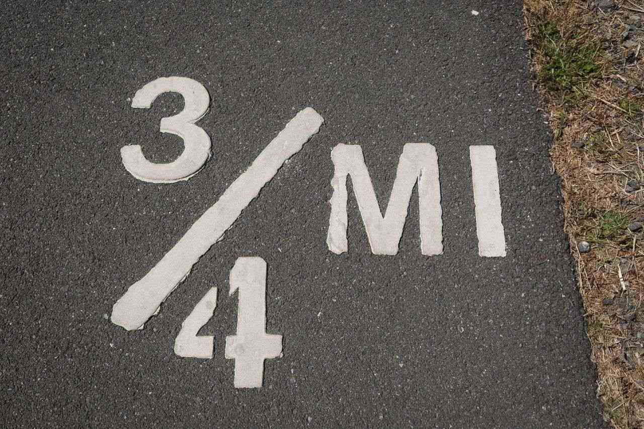 Three-quarter mile mark painted on pavement