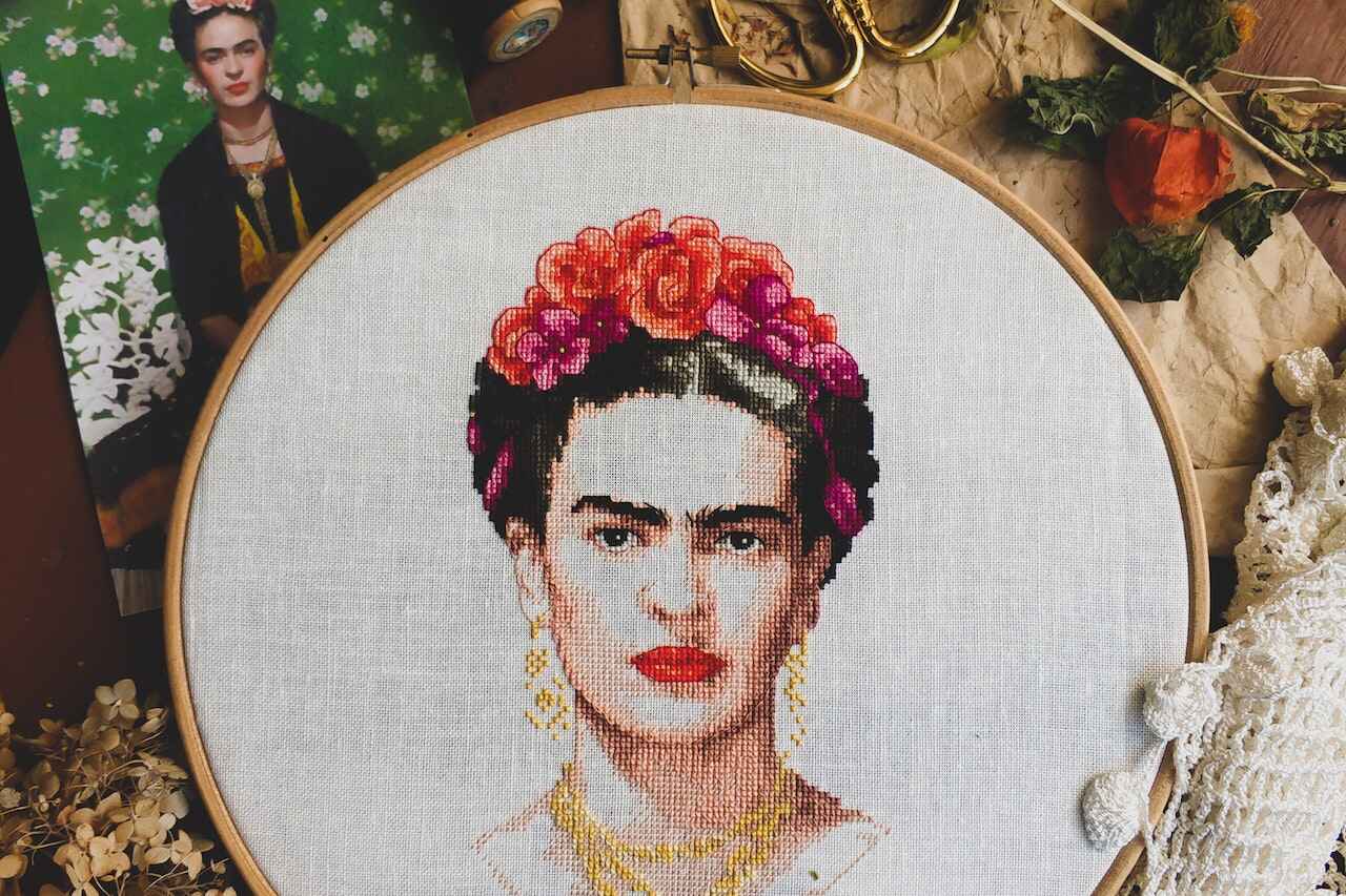 Embroidery hoop showing a portrait of Frida Kahlo