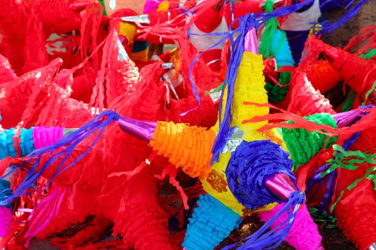 Colorful star-shaped piñatas in a festive arrangement