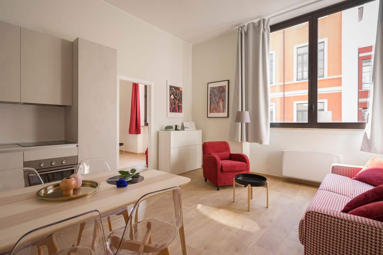 Modern living room with a red armchair