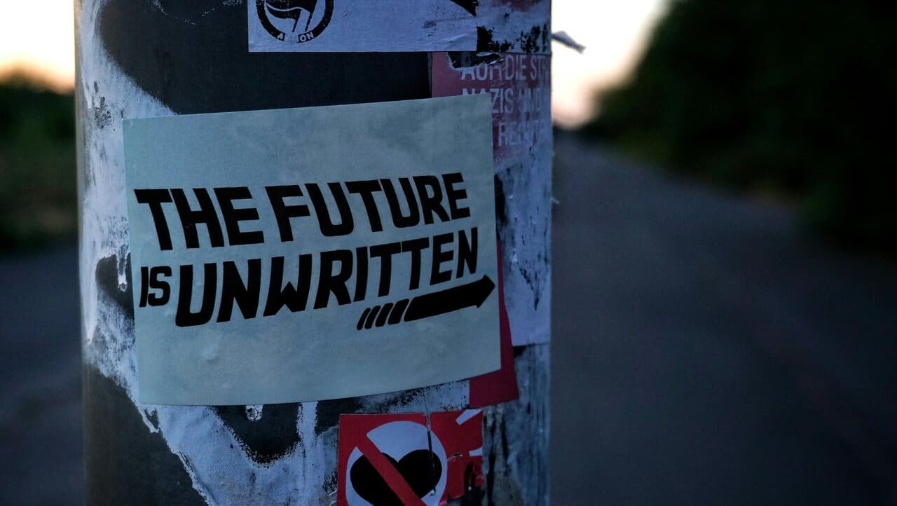 The sign in the image reads, “The future is unwritten,”