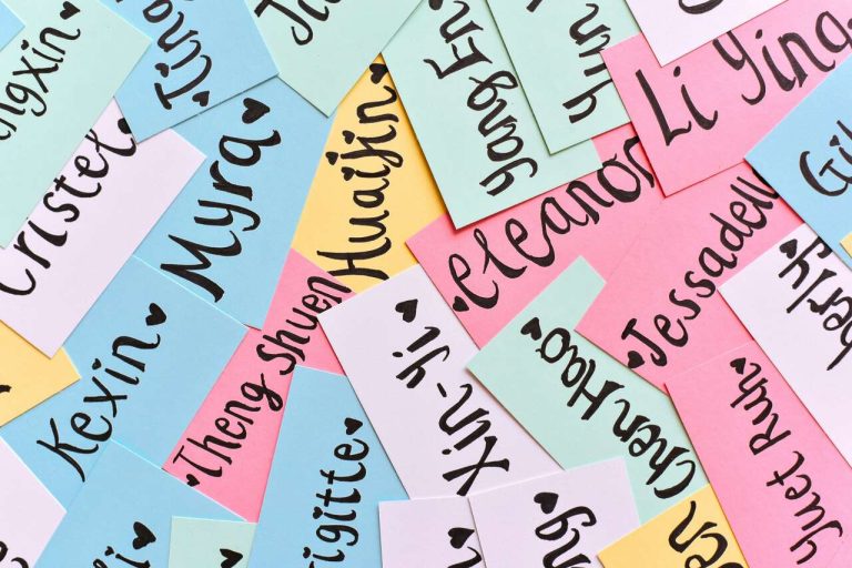 Colorful name tags with handwritten calligraphy.