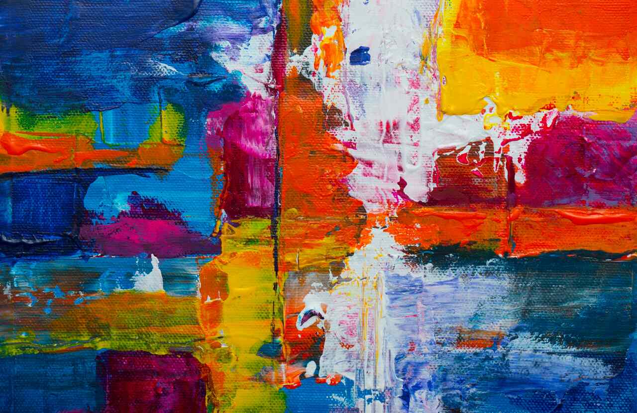 Abstract painting featuring bold, vibrant colors such as blue, orange, yellow, pink, and green, with thick brushstrokes creating a textured, layered effect.